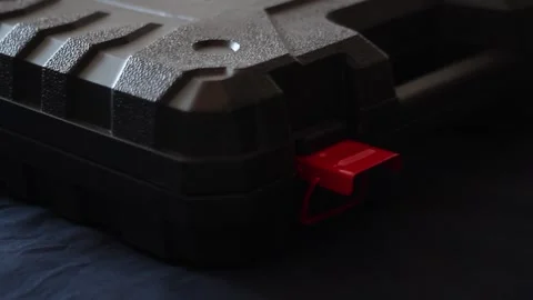 Opening the tool box set, power tool box opening. Hammer tool kit close up shot Stock Footage 242537717