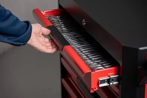Opening tool cabinet drawer Stock Photos
