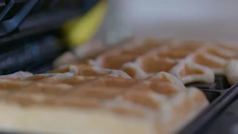 Opening waffle maker with fresh made belgian waffles Stock Footage 130490531