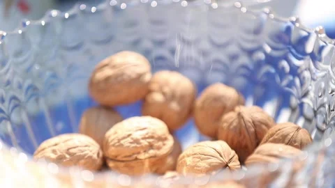 Opening walnuts with both hands Stock-Footage 133749206