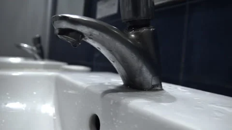 Opening water tap Stock Footage 60264561