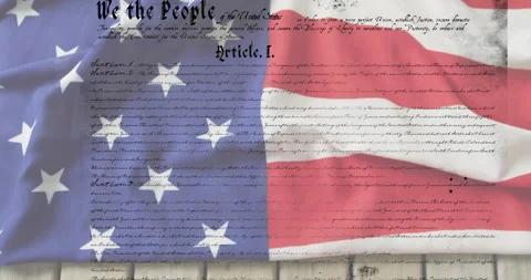Opening waving American flag with scrolling Constitution text revealing Article Stock Footage 309680404