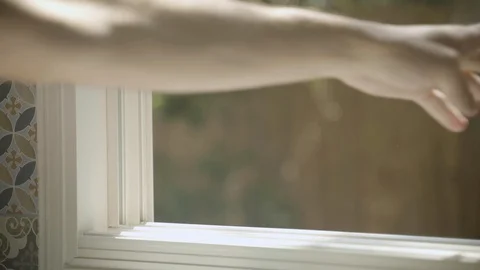 Opening a window to the outside world - close up Stock Footage 126422340