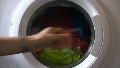 Opening window of a washing machine after washing Stock-Footage 105397211