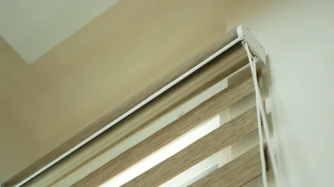 Opening window zebra blind curtain. 動画素材 145182296