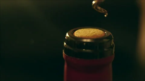 Opening the Wine Bottle with a Corkscrew Stock Footage 60387349