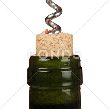 Opening a wine bottle with a corkscrew Stock Photos