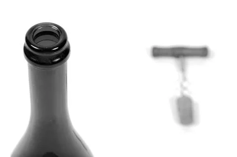 Opening wine bottle with a corkscrew. Stock Photos