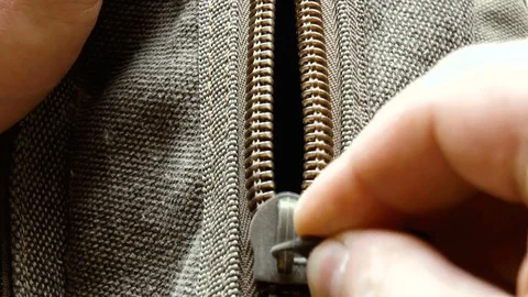 Opening the zipper on the bag Stock Footage 78914189
