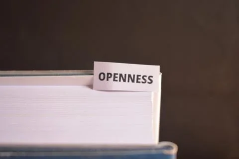 Openness Bookmark Inserted in Book Representing Transparency, Trust and Ope.. Stock Photos