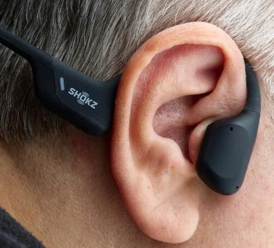 Openrun Pro by Shokz. Bone Conduction Sport Haedphones by Shokz. Stock Photos