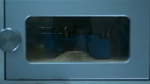 Opens the camera door of a 3d printer that prints metal Stock Footage 95445750