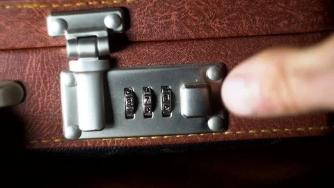 Opens the case with combination lock Stock Footage 82110237