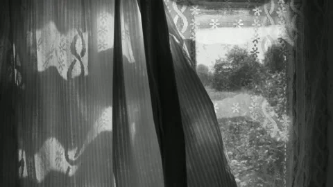 Opens the curtain on the old window Stock Footage 148256199