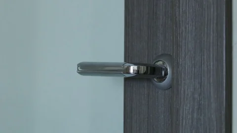 Opens the door and walks in Stock Footage