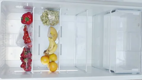 Opens Fridge Door, Stop Motion Animation of Vegetables and Fruits in Kitchen Stock Footage 168170168