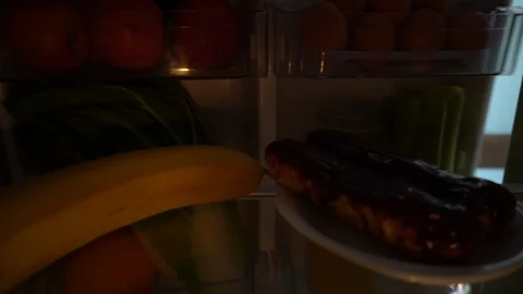 Opens the fridge Stock Footage 110628324