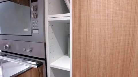 Opens the microwave door, presses the buttons Stock Footage 79241454