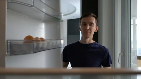 Opens the refrigerator takes the yogurt Video stock 109628941