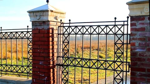 Openwork garden gate opens Stock Footage 106446922