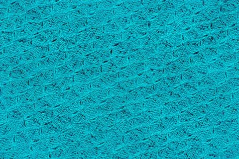 Openwork knitted fabric. Abstract background, woven texture. Stock Photos