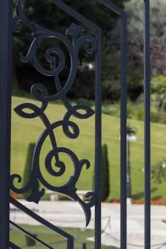 Openwork lattice in the garden Stock Photos