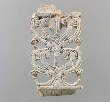 Openwork plaque with a hybrid tree ca. 9th8th century B.C. Assyrian Two set.. Foto stock