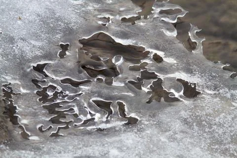 The openwork surface of the ice Stock Photos
