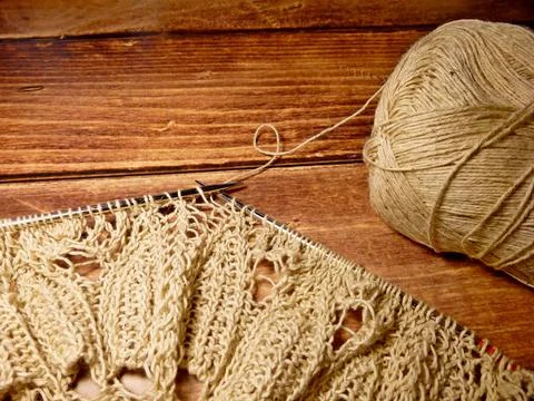 Openwork tablecloth in the process of knitting Stock Photos