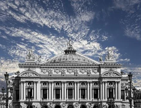 Opera Garnier (Garnier Palace)  against the clouds, Paris, France Stock Photos