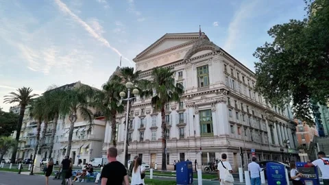 Opera house building in Nice at sunset with pedestrians Video stock 336923195