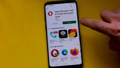 Opera mobile application is installed on a smartp Stock Footage 151683442