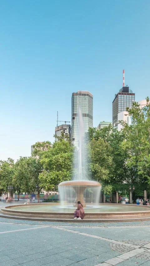 Opera Square timelapse hyperlapse downtown Frankfurt, fountain skyscrapers Stock Footage 324920728