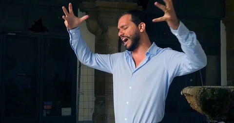 Opera tenor singer emotional performance in Lisbon, Portugal, 4K Stock Footage 117960067