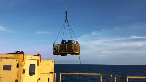  operate crane lifting cargo to boat with blue sky logistic concept Stock Footage 118433100