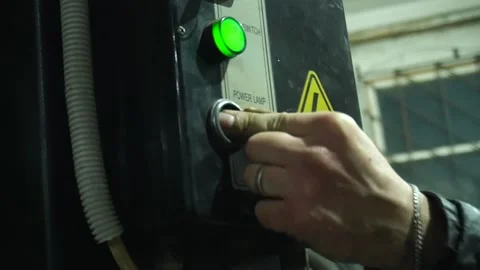 Operates a car lift Stock Footage 235680137