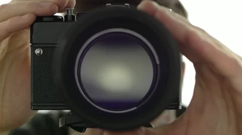 Operating an analog camera Video stock 20586818