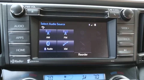 Operating the car radio Stock Footage 65827465