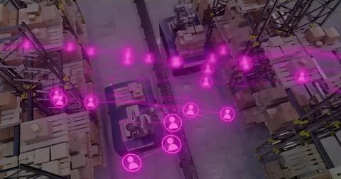 Operating central conveyor and robotic palletizers in warehouse, showing magenta Stock Photos