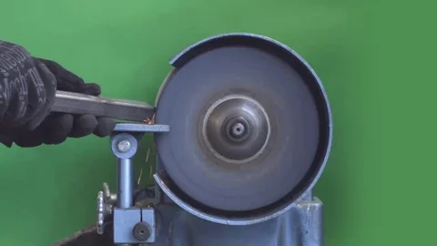 Operating a circular grindstone in slow motion, green screen Video stock 69289850