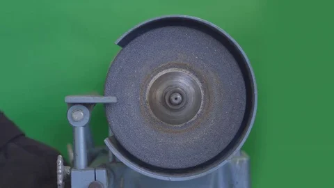 Operating a circular grindstone, slow motion, green screen Stock Footage 69290481