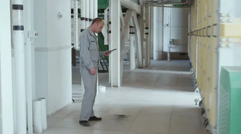 Operating controls of machines working on the tablet Stock Footage 60407349