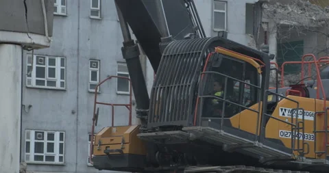 Operating a Demolition excavator Stock Footage 149495259