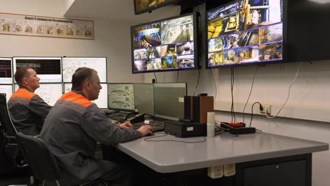 Operating engineer at the control desk in the wood processing industry Stockbeeldmateriaal 297347160