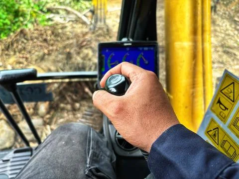 Operating the excavator Stock Photos