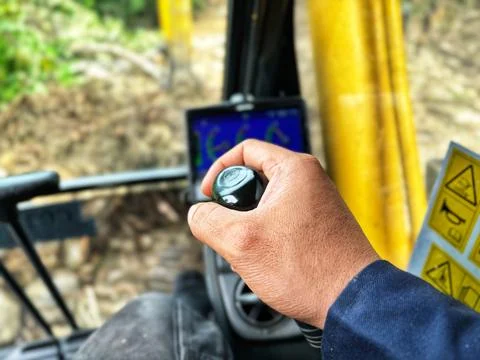 Operating the excavator Stock Photos