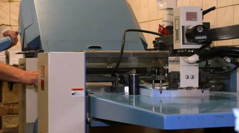 Operating folding machine Stock Footage 65499943