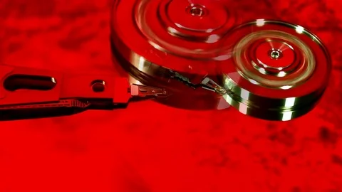 Operating hard disk drive on dark background. Stock Footage 78691592