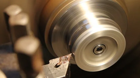 Operating the Industrial Lathe Stock Footage 119198631