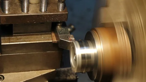 Operating the Industrial Lathe Stock Footage 119198651